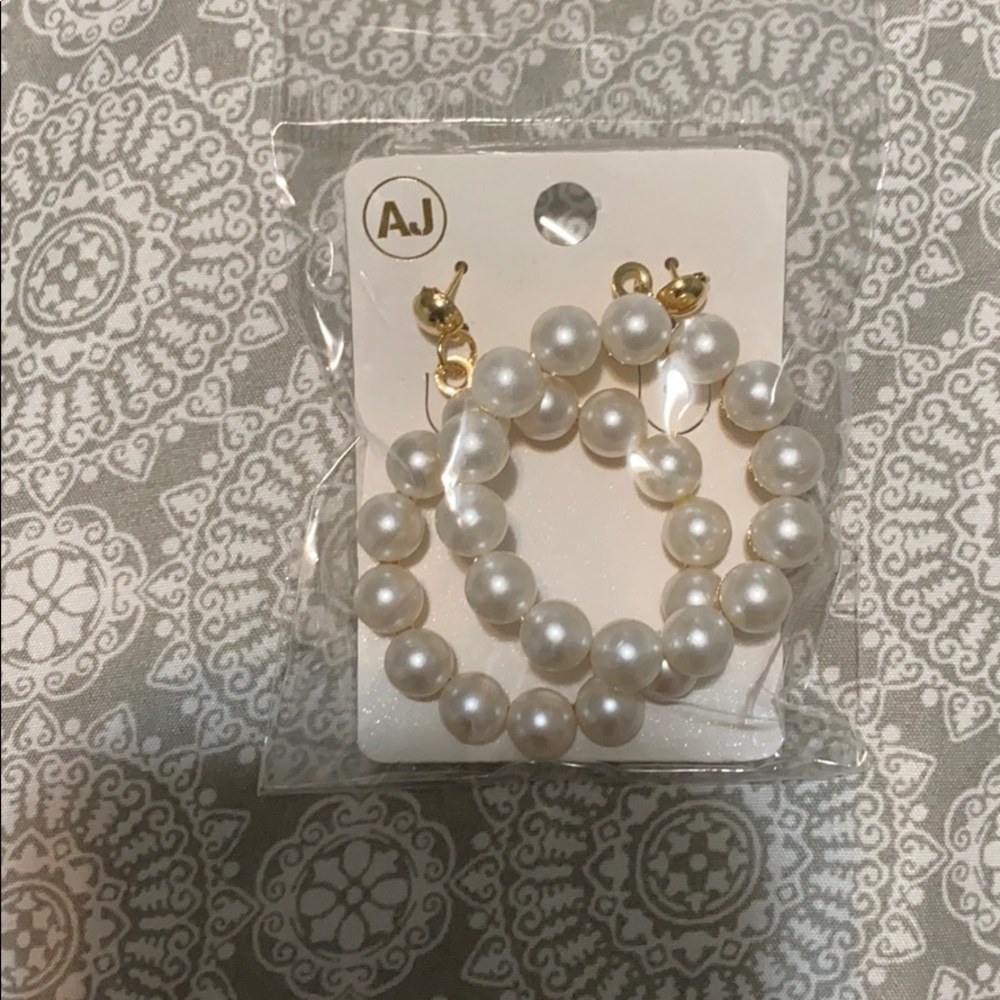 AJ Brand NEW faux pearl earrings. Costume jewelry